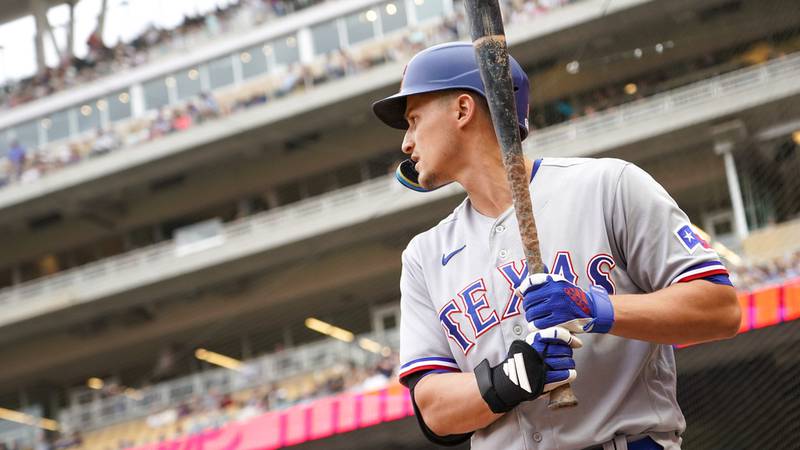 Texas Rangers' Corey Seager gets ready to bat against the Minnesota Twins during the first...