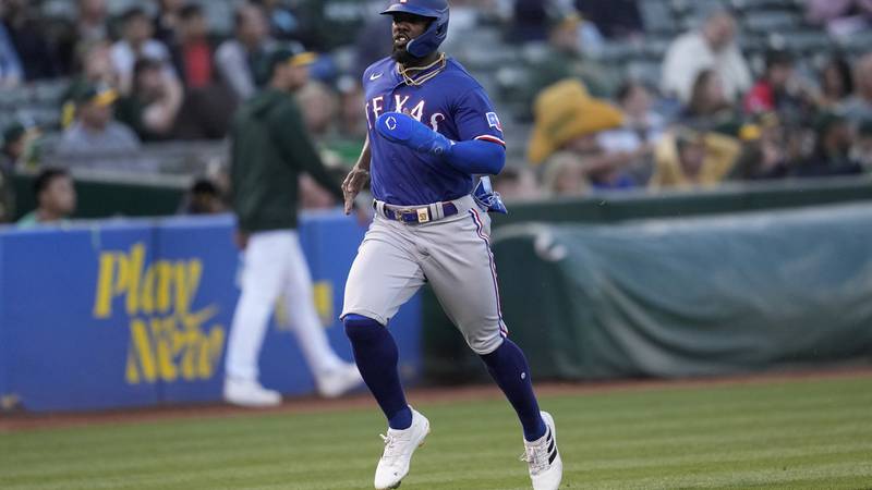 Texas Rangers' Adolis Garcia during a baseball game against the Oakland Athletics in Oakland,...